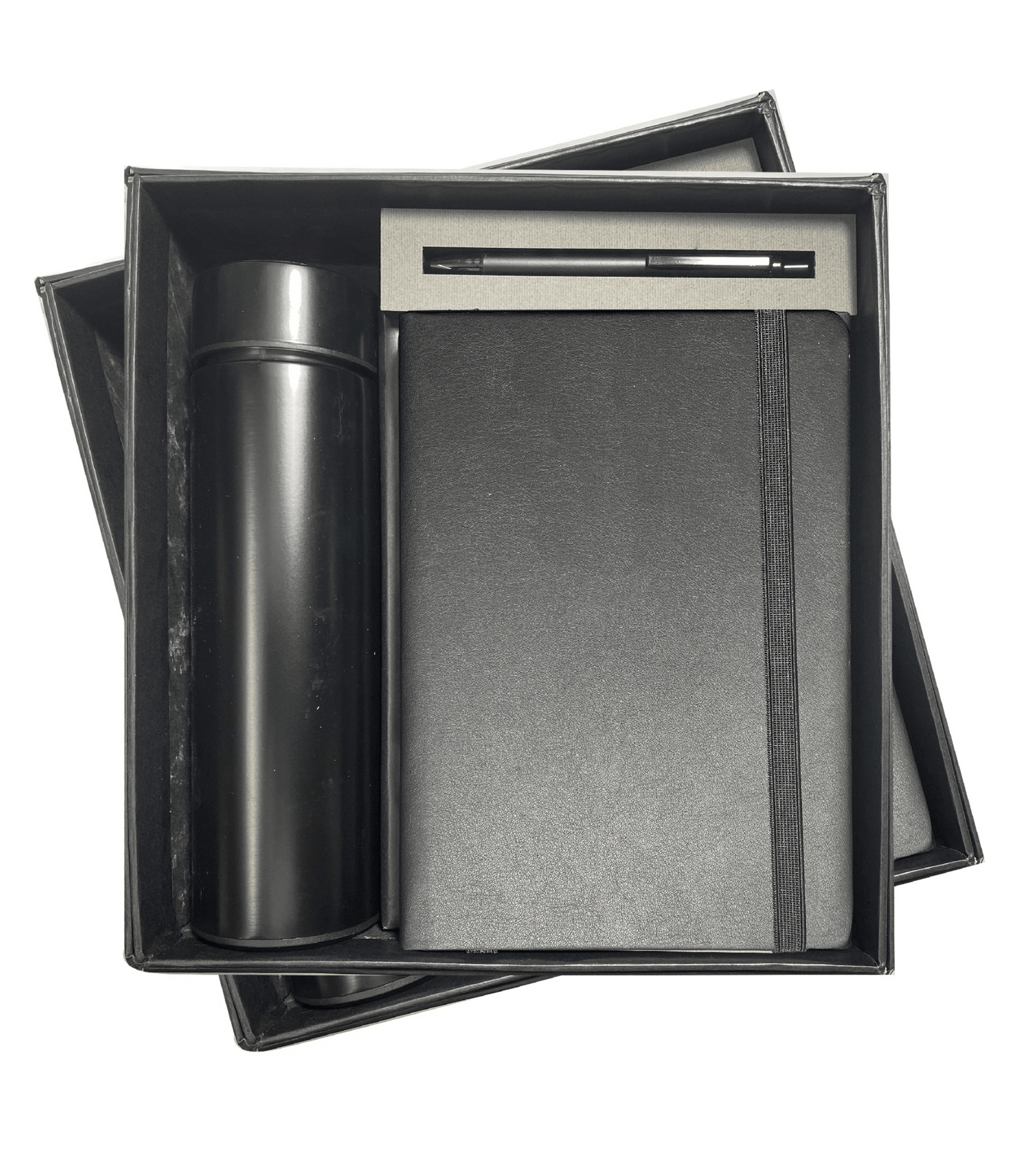The Verveet Black Diamond Set, a luxurious collection of premium corporate gifts, includes a black leather-bound notebook, an elegant black pen, and a sleek black cardholder. With its sophisticated and polished design, this set makes the perfect choice for high-end corporate gifting, offering a refined touch for professional occasions and events. Packaged in an upscale gift box, the Black Diamond Set embodies class and professionalism, leaving a lasting impression on clients and colleagues.