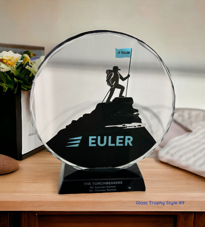 Engraved glass trophy with custom design, presented in a premium gift box, perfect for recognition awards and corporate events.