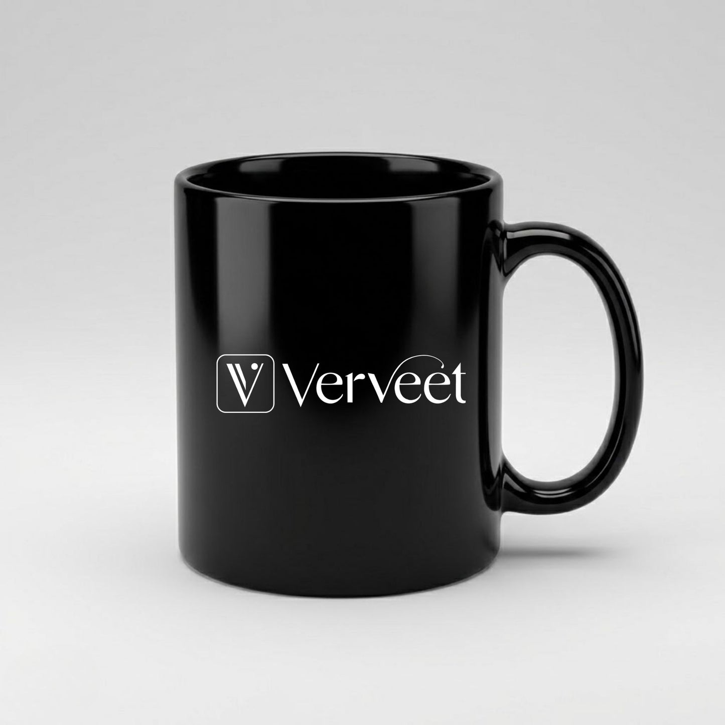 Black ceramic mug with corporate logo branding – customized promotional coffee mug for office and corporate gifts