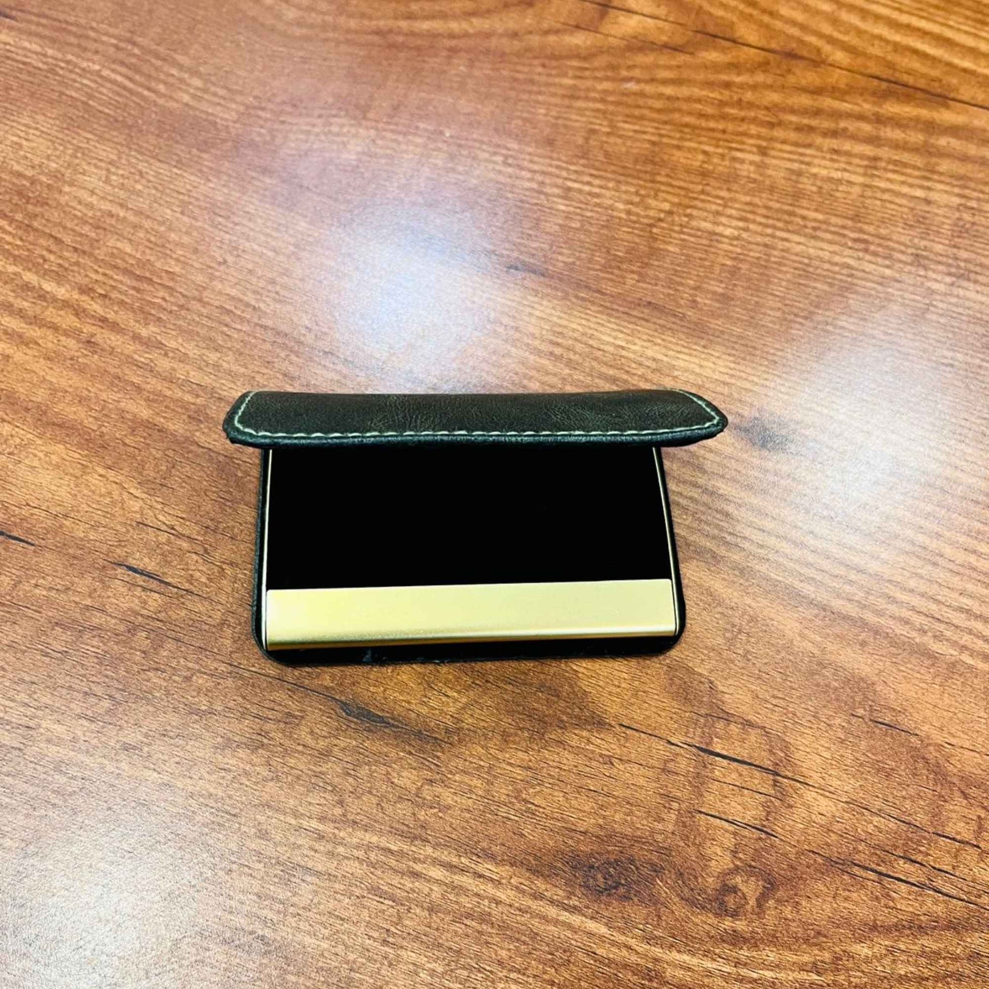 Green leather and metal visiting card holder for professional business card storage and corporate gifting