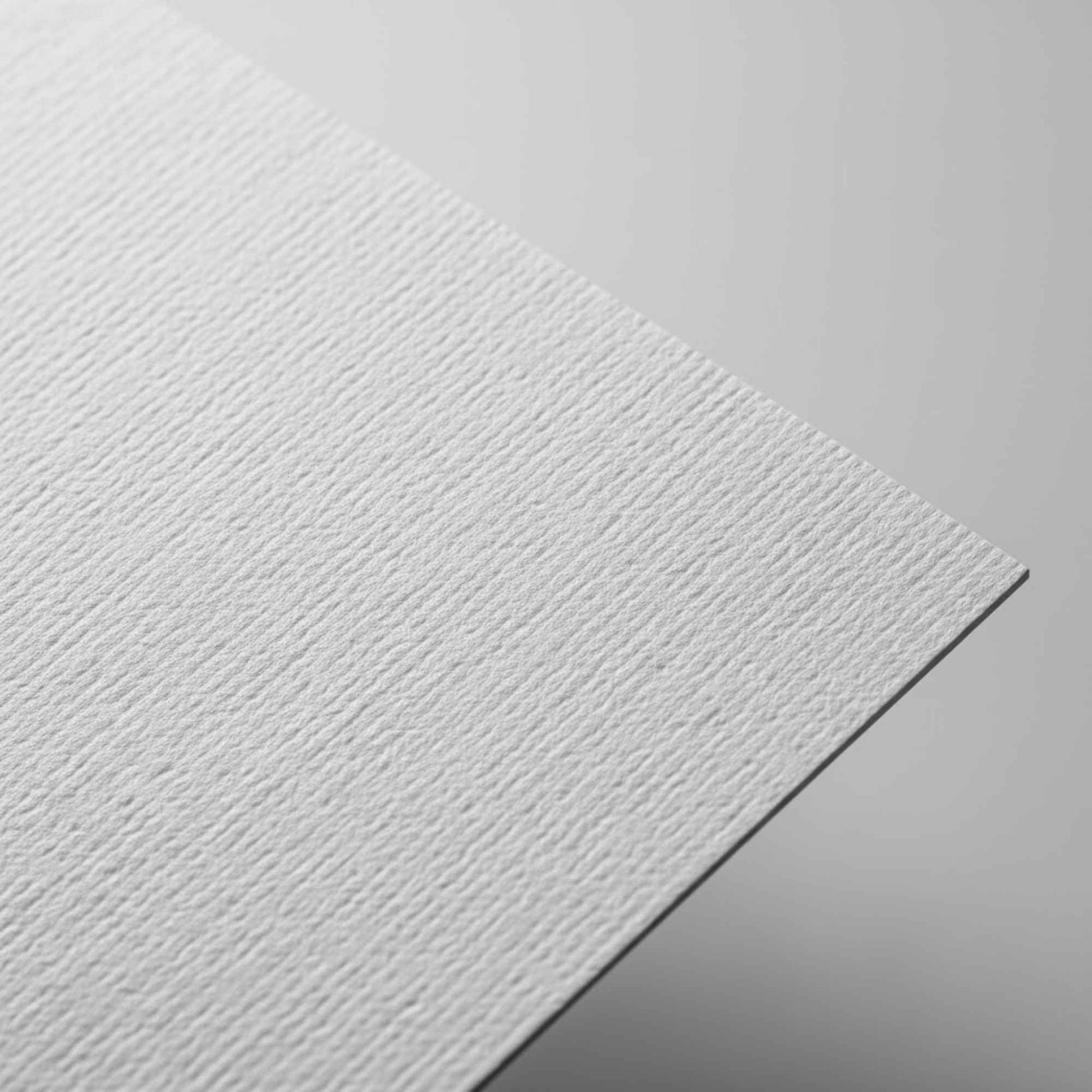 Textured paper business card closeup premium texture finish
