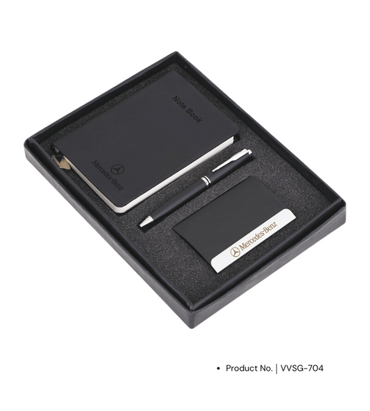 The Premium Gift Set (VVSG-704), featuring a card holder, pen, and diary. This elegant set includes a sleek card holder for business essentials, a stylish pen for smooth writing, and a high-quality diary to keep important notes organized. A perfect choice for corporate gifting, combining practicality with a touch of sophistication for professionals, clients, or special occasions.