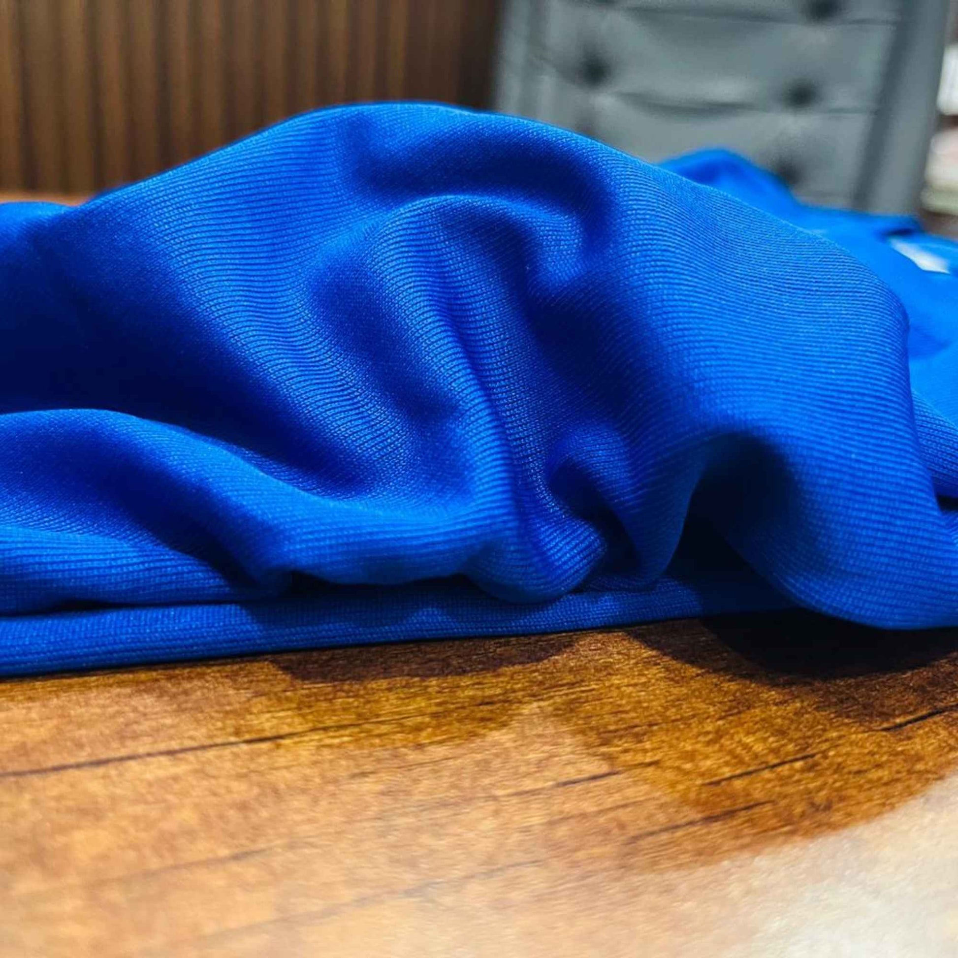 Sarena performance T-shirt in blue with breathable dry-fit fabric for sports, fitness, and event wear